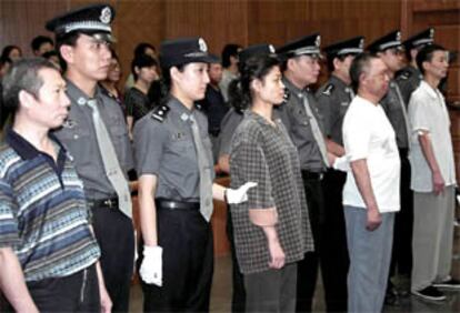 Los cuatro condenados, durante su juicio en Beijing