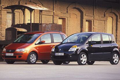Dos interpretaciones estéticas diferentes de un mismo concepto. El Fiat Idea (izquierda) tiene un frontal de estilo más discreto, y el Renault Modus (derecha) presenta un diseño más vanguardista y expresivo.