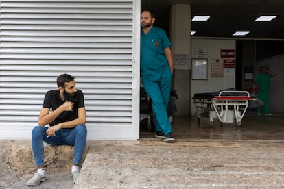 A doctor at the entrance of the Lebanese People's Aid hospital in Nabatieh.