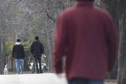 Two petty drug dealers in Madrid's Retiro park.