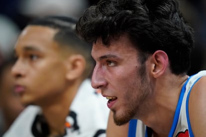 Oklahoma City Thunder forward Chet Holmgren, right, looks on from the bench in the first half during an NBA Summer League basketball game against the Utah Jazz, Monday, July 3, 2023, in Salt Lake City.