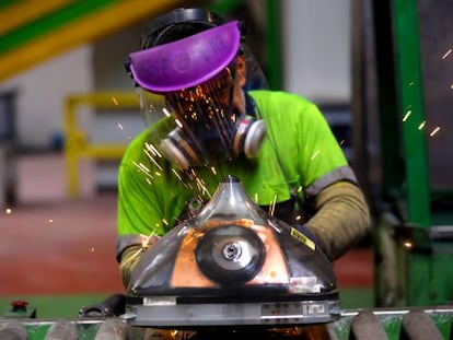 A worker at a recycling plant outside Madrid.