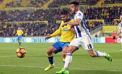 Tanaus&uacute; y Berchiche durante el partido.