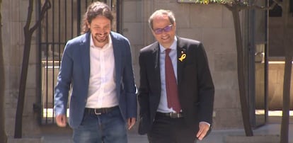 El presidente del Govern, Quim Torra (derecha), y el secretario general de Podemos, Pablo Iglesias, en Barcelona este lunes.