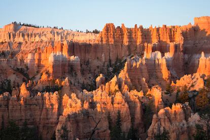 The sun rises over Bryce Canyon National Park, Utah, before a rare "ring of fire" eclipse of the sun.