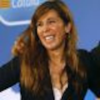 Rajoy embraces Camacho, during the closure meeting of a Party Convention in Barcelona