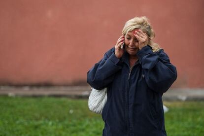 A relative of passengers involved in the Galicia train crash waits for news on Wednesday morning.