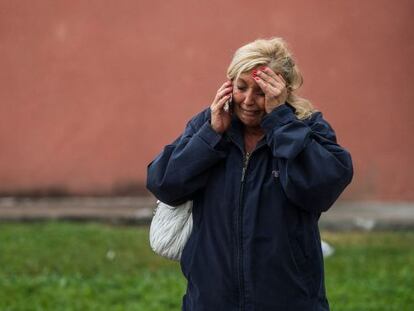 A relative of passengers involved in the Galicia train crash waits for news on Wednesday morning.