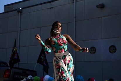 A drag queen with Joy to the Polls performs as voters cast ballots at Buddy’s Houston, the world's first presidential polling location at an LGBTQ+ bar, on Election Day in Houston, Texas, U.S., November 3, 2020.