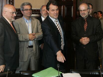 De izquierda a derecha, Josep Huguet, Joan Saura, Artur Mas y Antoni Castells.