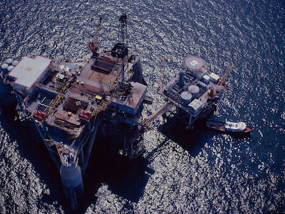 Offshore drilling rig next to a production platform in the Gulf of Mexico.