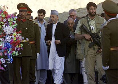 El presidente de Afganistán, Hamid Karzai, acude a un acto en memoria de Ahmad Masud, asesinado por miembros de Al Qaeda.