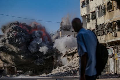 Smoke rises at the Al Harazin building following an air strike during an Israeli military operation in Gaza City.