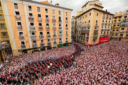 A music band plays in the town hall square after the 'Chupinazo' rocket, to mark the official opening of the 2023 San Fermín fiestas in Pamplona, Spain, 