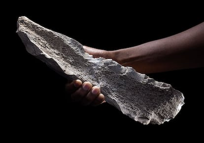 A person holds one of the tools found in Tanzania.