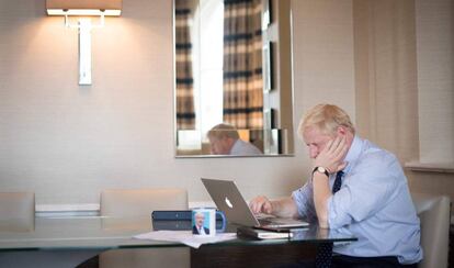 Britain's Prime Minister Boris Johnson prepares his keynote speech for the annual Conservative Party conference in Manchester, northwest England, on October 1, 2019 which he'll deliver on the final day on October 2. - Britain is on the verge of submitting proposals for a new Brexit deal, Prime Minister Boris Johnson said Tuesday, even as France warned that failure to get a new agreement was the most likely outcome as the deadline loomed. (Photo by Stefan Rousseau / POOL / AFP)