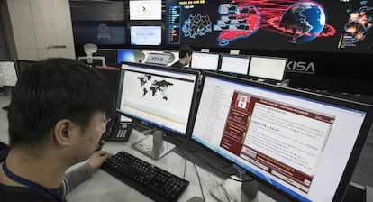 A technician in South Korea monitors a cyberattack.