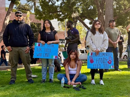 On Tuesday, the protesters listened to the community organizers in front of the former Orange County Palace in Santa Ana.