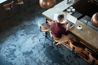 Man working at a café