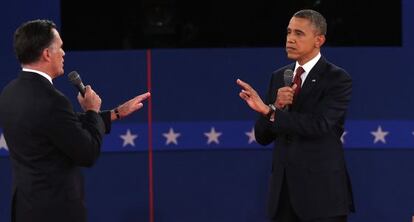 Obama y Romney se enfrentan en el debate.