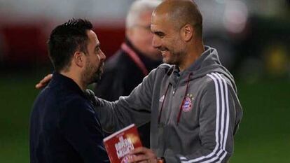 Xavi Hernández y Pep Guardiola