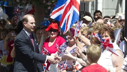 Britain's Prince Edward, Earl of Wessex (L) greets people as he arrives in Gibraltar June 11.