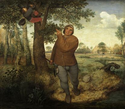 Este género de pintura no tiene retratos de nobles o ricos, pero sí de gente corriente y al margen de la sociedad. Esta obra es de Pieter Brueghel, 'El labriego y el ladrón de pájaros', 1568.