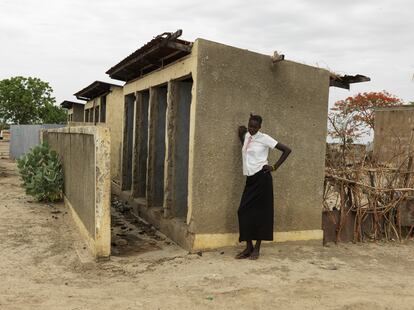 16-year-old Maria Nyasebit stands beside the Machakos Primary School bathroom in Bentiu. “The bathrooms at school don't have doors, so when you want to change your pad, people can see you. I wait until I get home to do it.”