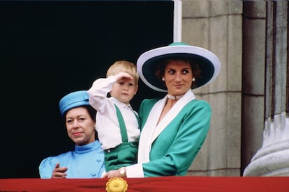 Diana, Princess of Wales, holding a young Prince Harry.