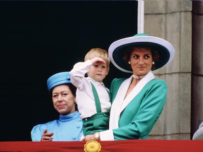 Diana, Princess of Wales, holding a young Prince Harry.