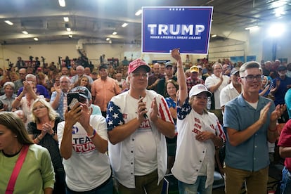 Audience members react during a fundraising event for U.S. Rep. Ashley Hinson, R-Iowa, Sunday, Aug. 6, 2023, in Cedar Rapids, Iowa. (AP Photo/Charlie Neibergall)