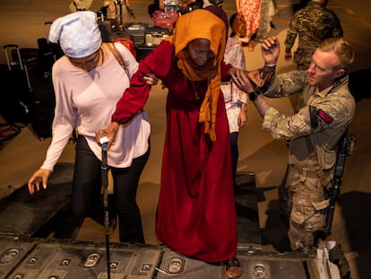 British Nationals seen here boarding an RAF aircraft in Akrotiri, Cyprus, after being evacuated from Sudan