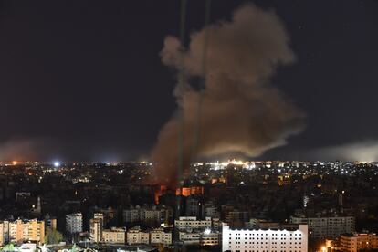 Smoke and flames are rising in Beirut's southern suburbs following last night's airstrike on the Lebanese capital.