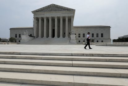 A police officer patrols outside the U.S. Supreme Court in Washington, U.S. June 30, 2023