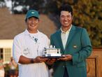 Augusta (United States), 11/04/2021.- Hideki Matsuyama of Japan celebrates with caddie Shota Hayafuji (L) during the green jacket ceremony after winning the 2021 Masters Tournament at the Augusta National Golf Club in Augusta, Georgia, USA, 11 April 2021. The 2021 Masters Tournament is held 08 April through 11 April 2021. (Japón, Estados Unidos) EFE/EPA/ERIK S. LESSER