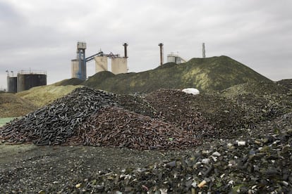 In this  Wednesday, Jan. 27, 2016 photo, broken glass bottles are piled up later to be recycled at the Phoenicia Glass Works Ltd.  factory in the southern Israeli town of Yeruham. Factory workers grind these rejects into shards and pile them outside. Recycled glass bottles from across the country are sent here and ground up, too. The glass pieces are shoveled into the ovens to be fired into new glass bottles. Sand, the basic ingredient of glass, is hauled in from a nearby desert quarry. (AP Photo/Oded Balilty)