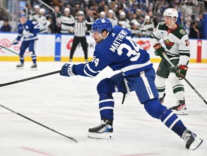 Toronto Maple Leafs forward Auston Matthews (34) shoots the puck against the Minnesota Wild in the third period at Scotiabank Arena.