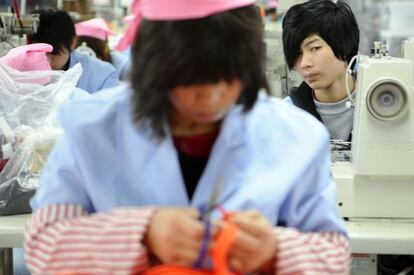 Trabajadores de la fábrica textil de la empresa Antex, en Hangzhou.