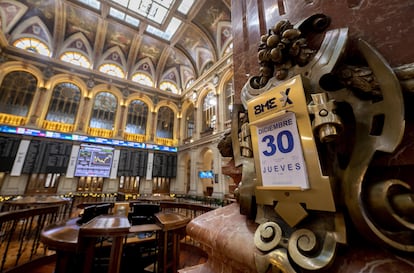 Paneles en el Palacio de la Bolsa de Madrid, en la última sesión del año.