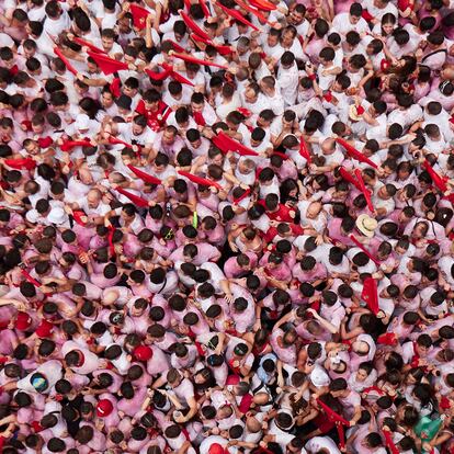 PAMPLONA, NAVARRA, SPAIN - JULY 06: Dozens of people raise the traditional red handkerchief during the chupinazo that kicks off the Sanfermines 2023, in the Plaza del Ayuntamiento, July 6, 2023, in Pamplona, Navarra, Spain. The festivities in honor of San Fermin, patron saint of Navarre, begin on the 6th with the traditional chupinazo and continue until July 14 with the chant of 'Pobre de mi' (Poor me). Once again this year, the street is the main stage of the San Fermin festivities, dates in which 542 official events have been scheduled, 300 of them of a musical nature. The main activity of the Sanfermines are the running of the bulls, which are held during the eight days of festivities at eight o'clock in the morning. This festival, which attracts millions of visitors every year for its festive atmosphere and its popular running of the bulls, has been declared of International Tourist Interest. The festivities coincide with the election campaign for the general elections on July 23, which for the first time will coincide in part with the Sanfermines. (Photo By Eduardo Sanz/Europa Press via Getty Images)