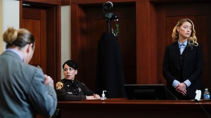 Amber Heard in court on Wednesday. In the foreground, her ex-husband, Johnny Depp.