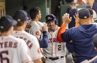 Houston Astros' Alex Bregman celebrates his home run with teammates in the dugout against the Baltimore Orioles in the third inning at Minute Maid Park, in Houston, Texas, on Sept. 19, 2023.