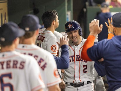 Houston Astros' Alex Bregman celebrates his home run with teammates in the dugout against the Baltimore Orioles in the third inning at Minute Maid Park, in Houston, Texas, on Sept. 19, 2023.