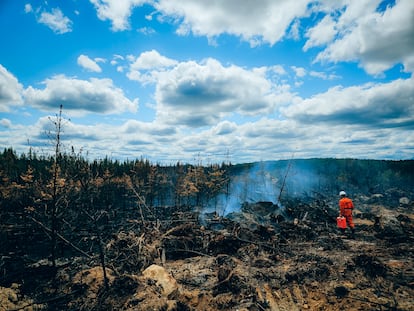 French firefighters try to extinguish forest fires in Quebec, Canada, on June 18, 2023.