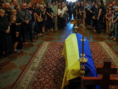 Ukrainian writer Victoria Amelina’s relatives and friends at her funeral on Tuesday in Kyiv, Ukraine.