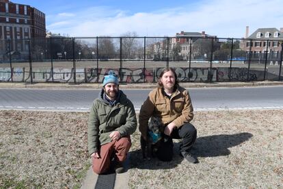 Dustin Klein and Alex Criqui, from Reclaiming the Monument, projected images of George Floyd and illustrious figures from African-American history onto the General Robert E. Lee monument during the 2020 Black Lives Matter protests. In this image, they pose where that statue once stood. 