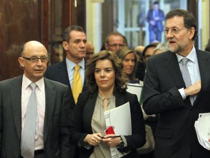 Crist&oacute;bal Montoro, Soraya S&aacute;enz de Santamar&iacute;a y Mariano Rajoy en el Congreso. 