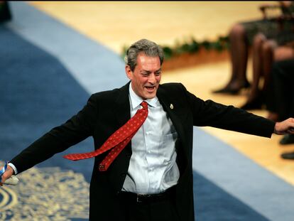 Paul Auster celebrates winning the Letters Award. (Photo by Pool/Corbis via Getty Images)