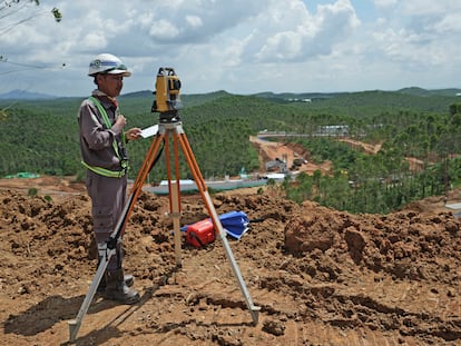 Worker uses his equipment at the construction site of the new capital city in Penajam Paser Utara, East Kalimantan, Indonesia, Wednesday, March 8, 2023.