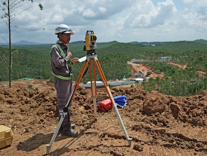 Worker uses his equipment at the construction site of the new capital city in Penajam Paser Utara, East Kalimantan, Indonesia, Wednesday, March 8, 2023.